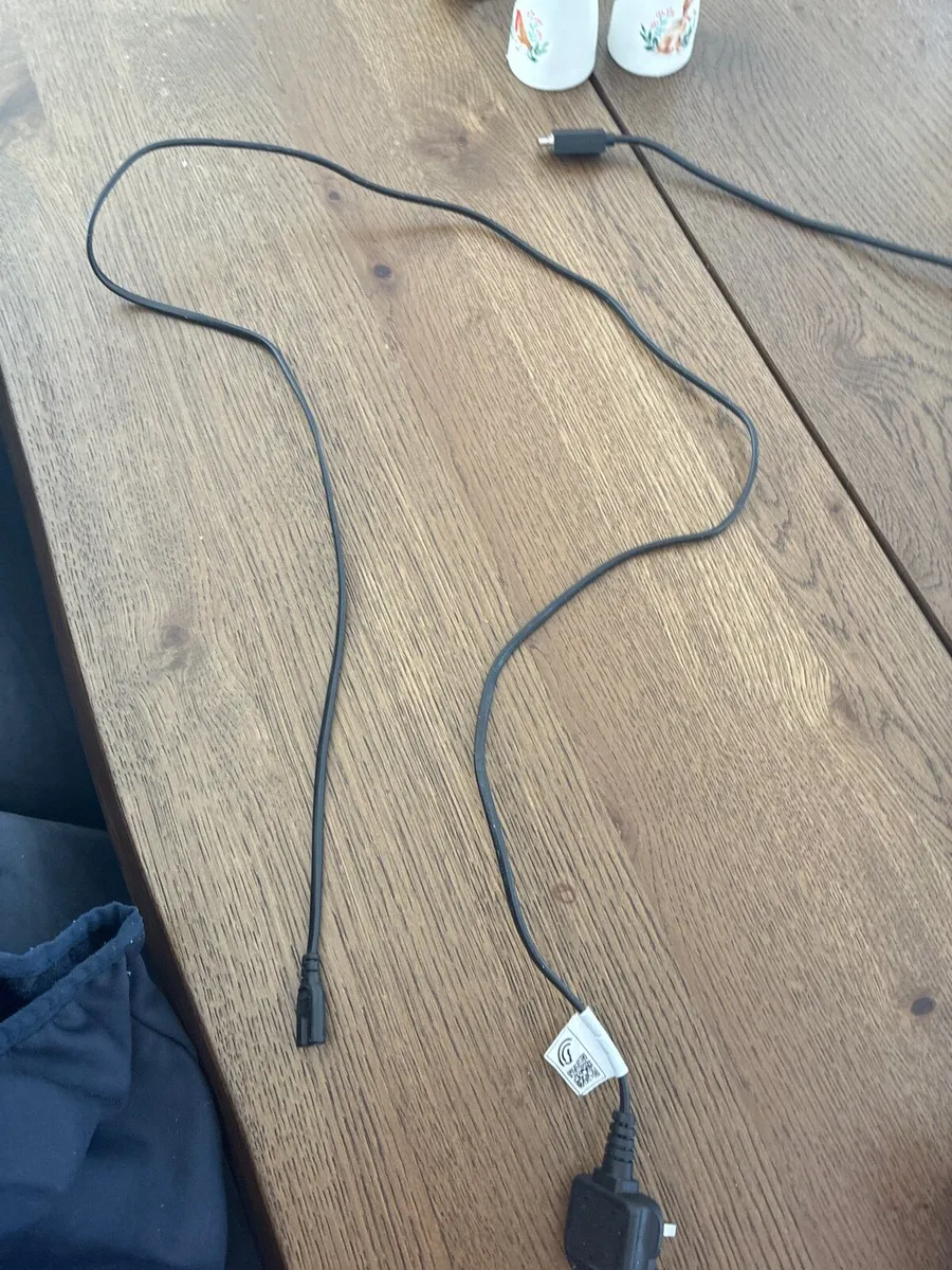 PS5 and a blue ps5 controller - Image 4
