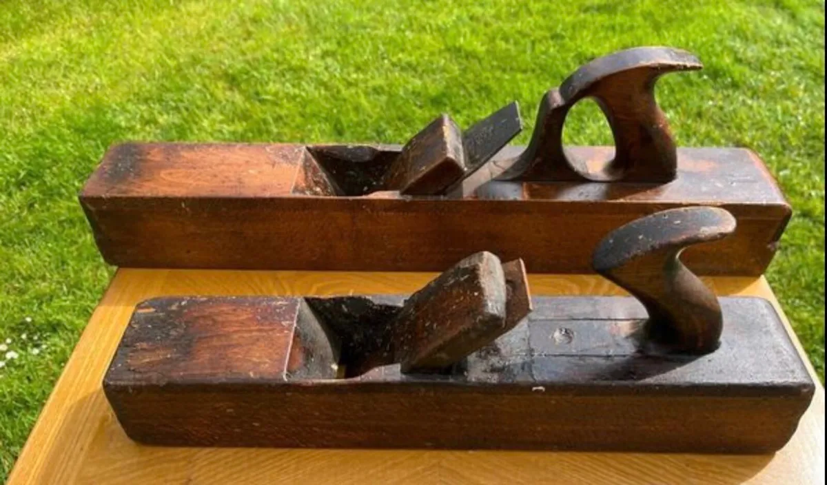 Two antique wood planes