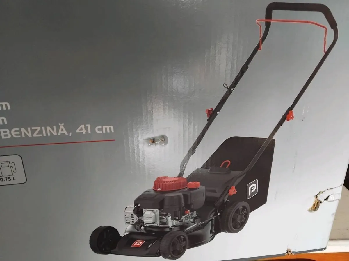 Petrol lawnmower brand new in box not used - Image 1