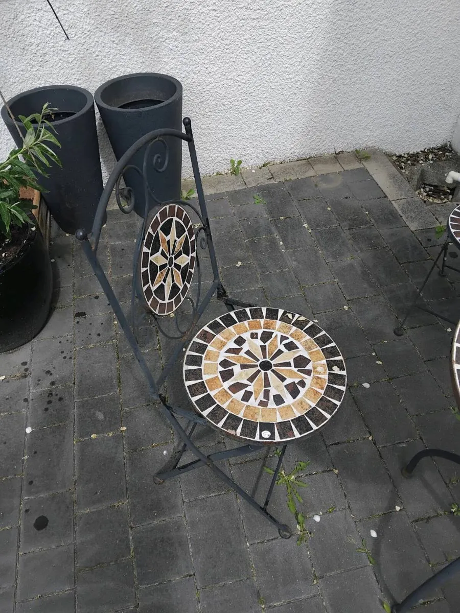Wrought iron garden chairs , folding