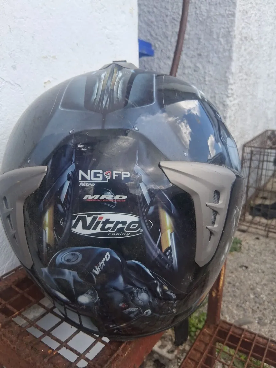 Leather biker pants and helmet - Image 1