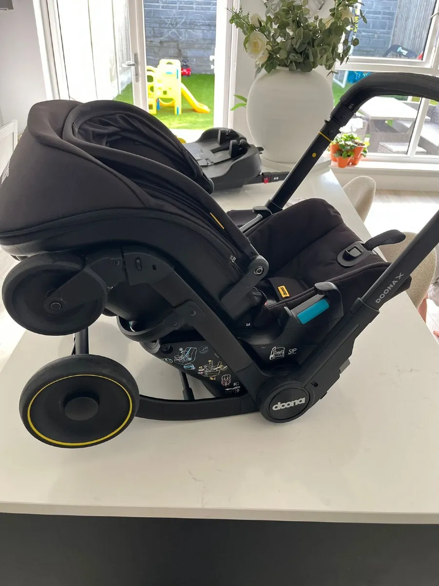 Doona X Car Seat & Stroller With ISOFIX base - Image 1