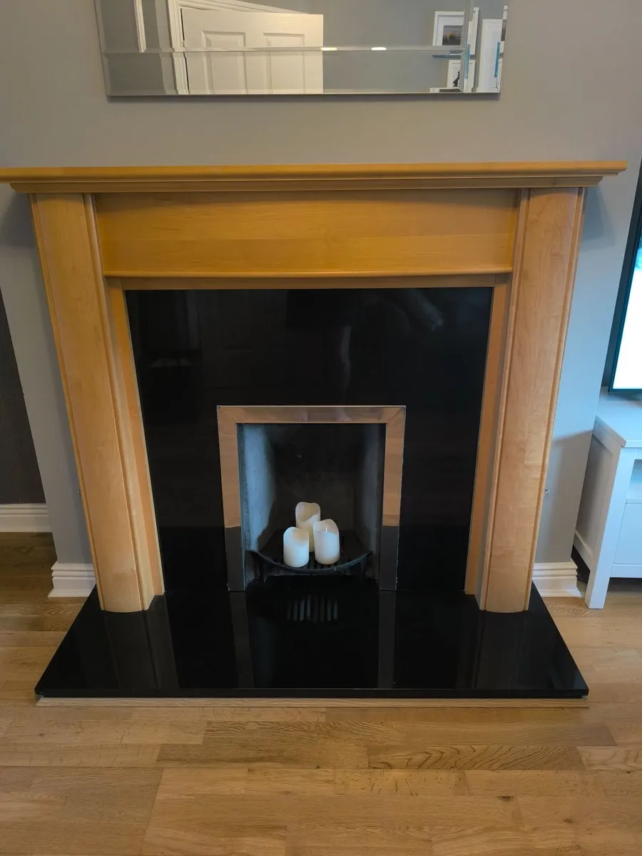 Timber Fireplace and black surrounds