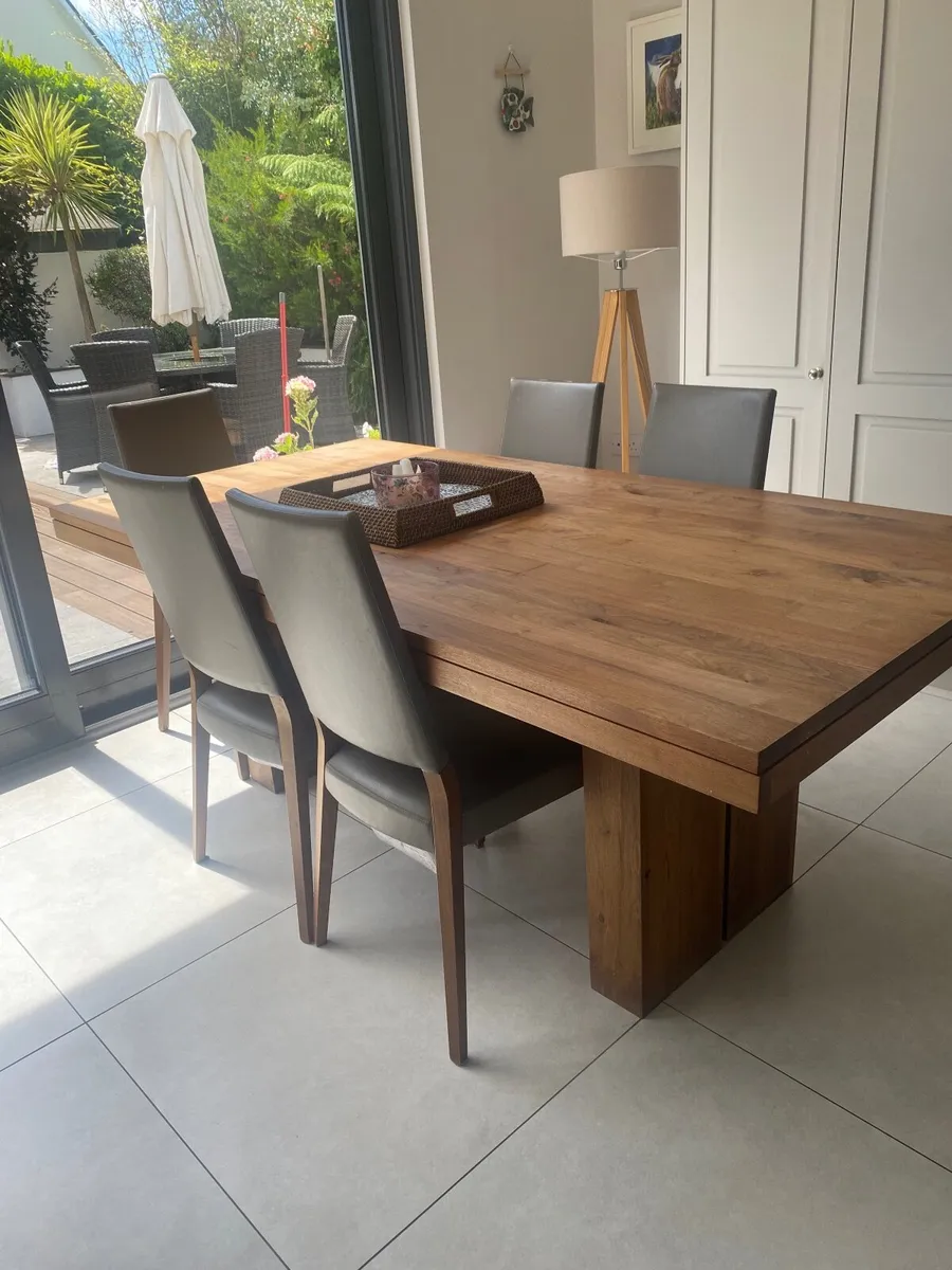 Solid wood (walnut) table and 6 faux leather chair - Image 1