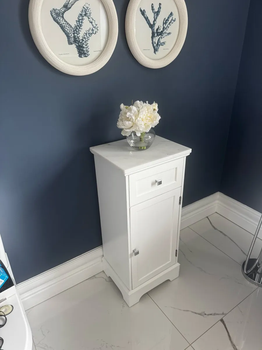 White bathroom storage unit with marble top - Image 1
