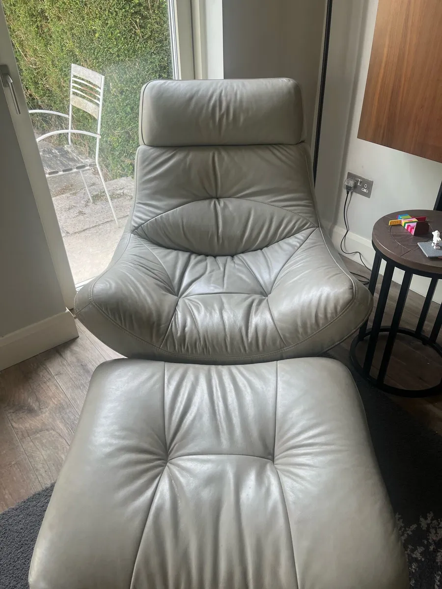 Grey swivel chair and footstool - Image 1
