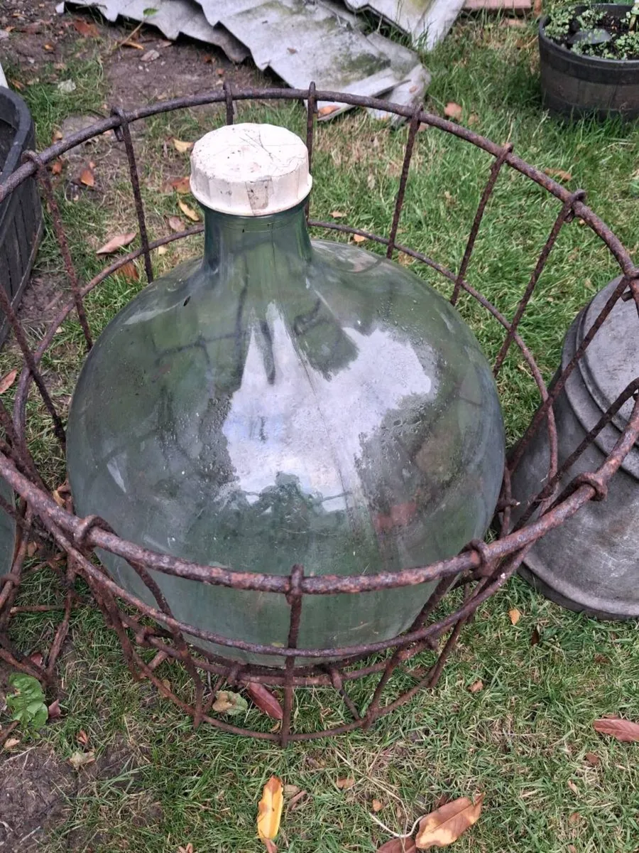 Carboy caged antique bottles - Image 1