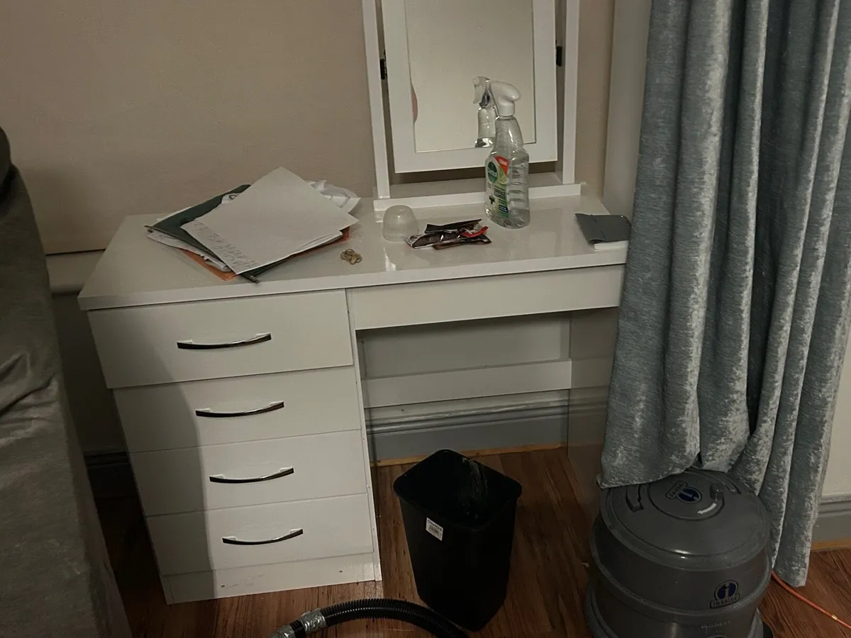 Woman’s dressing closet with chair
