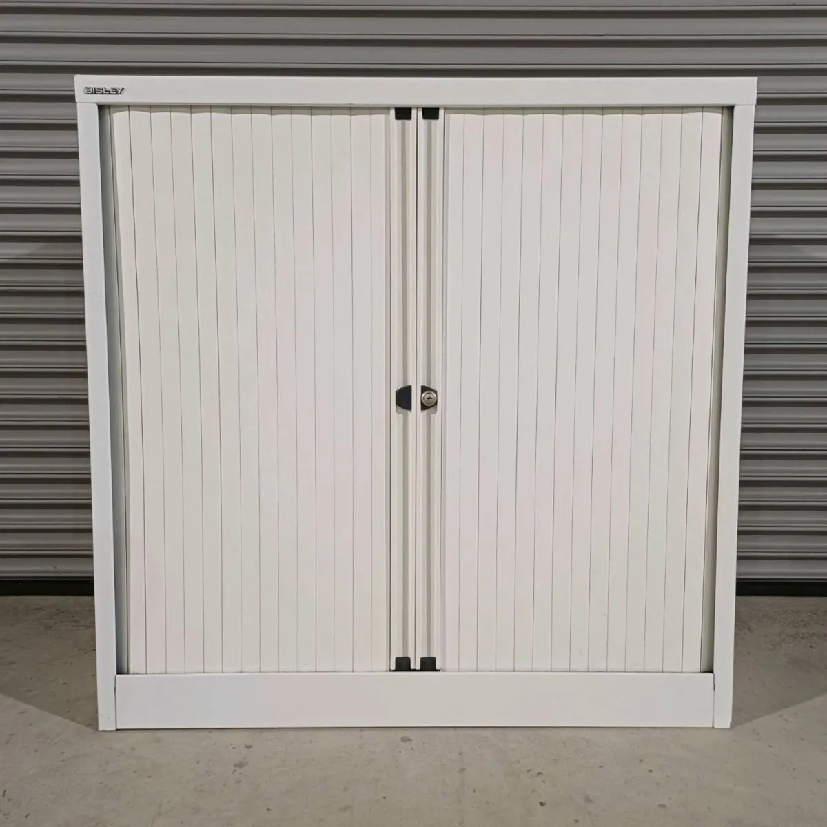 1m Bisley Chalk White Steel Tambour Cabinet - Image 1