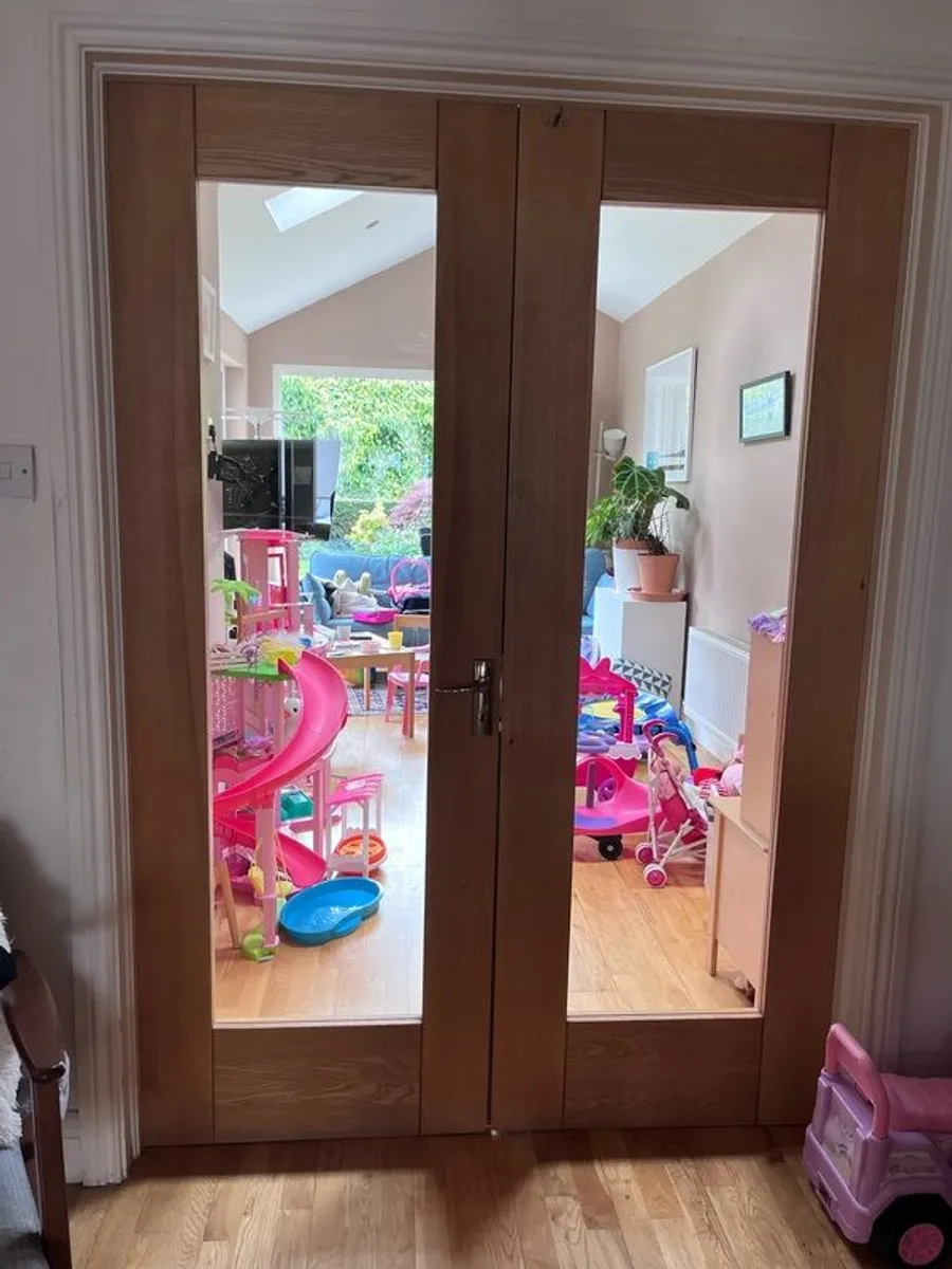 Solid wood internal double doors with clear glass panels - Image 1
