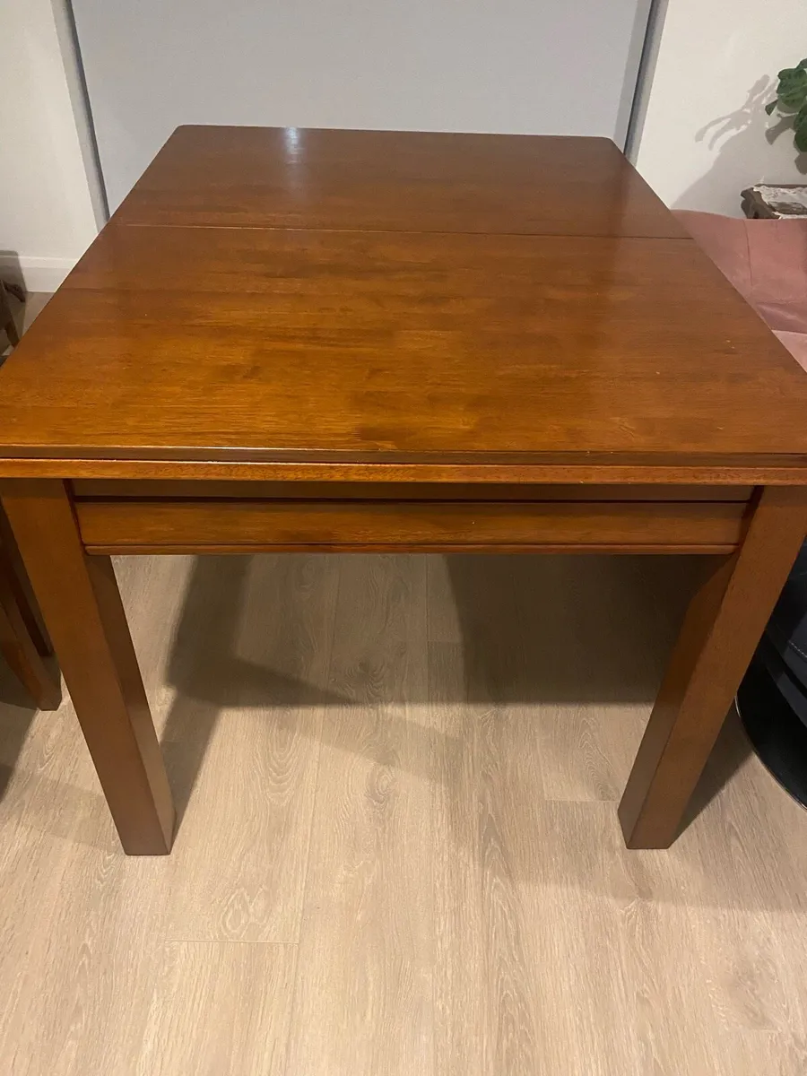 Extending oak dining table - Image 4