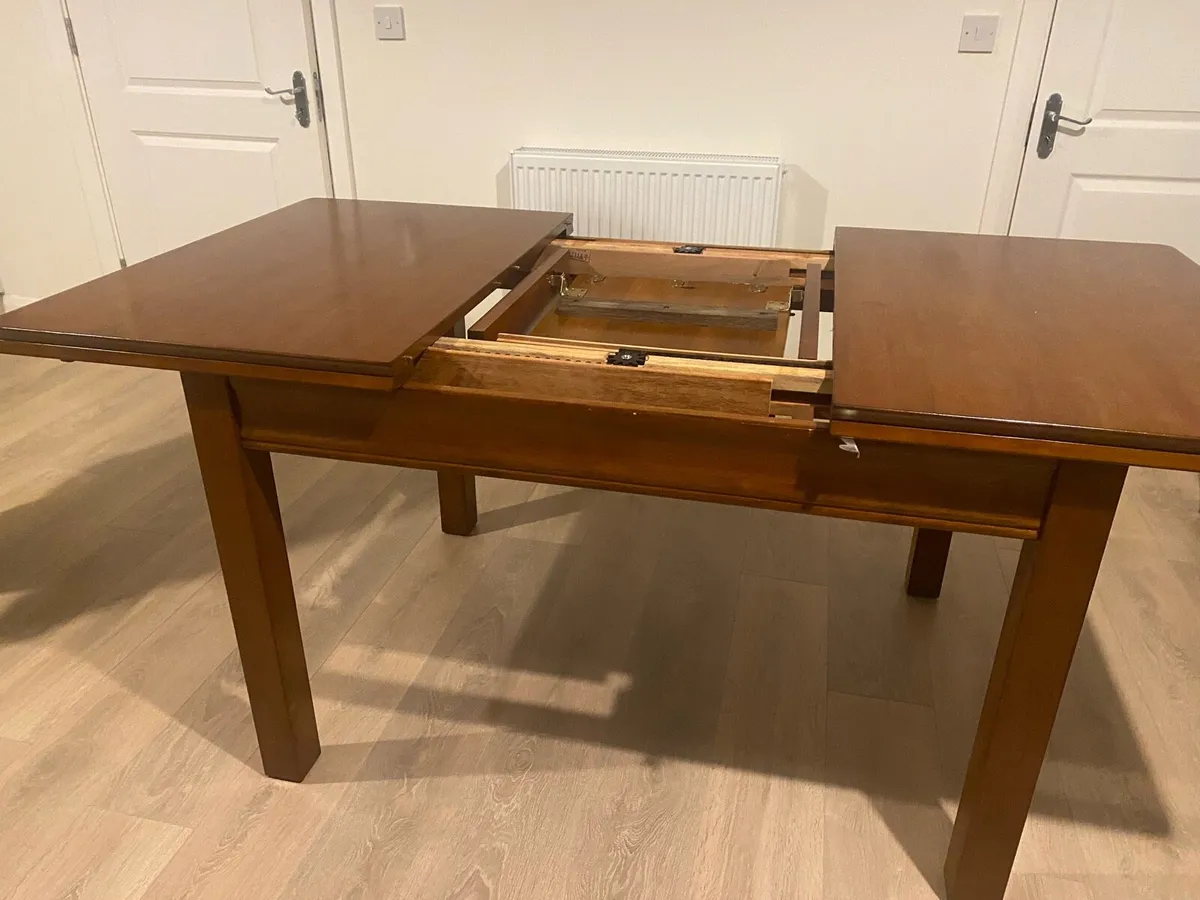 Extending oak dining table - Image 2