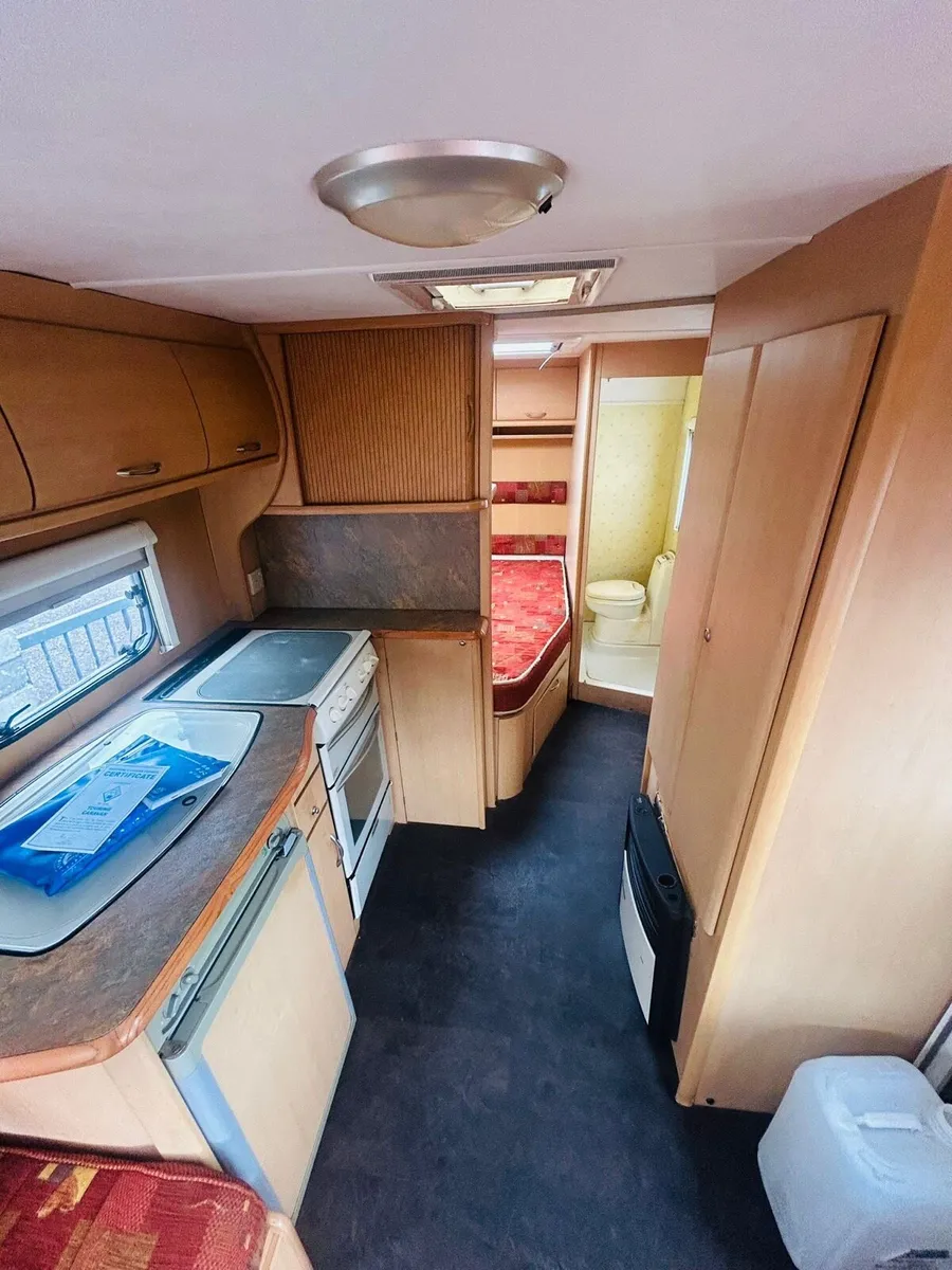 Abbey adventure 4/5 berth caravan fixed bed - Image 3
