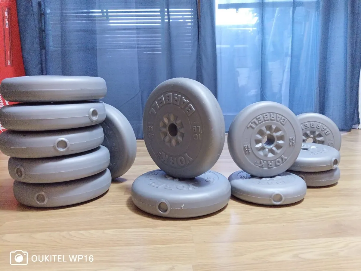 Weights for a barbell for weightlifting training. - Image 4