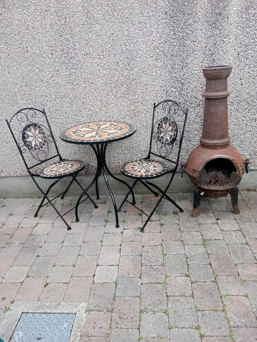 Garden table and 2 chairs  one cast iron stove - Image 1