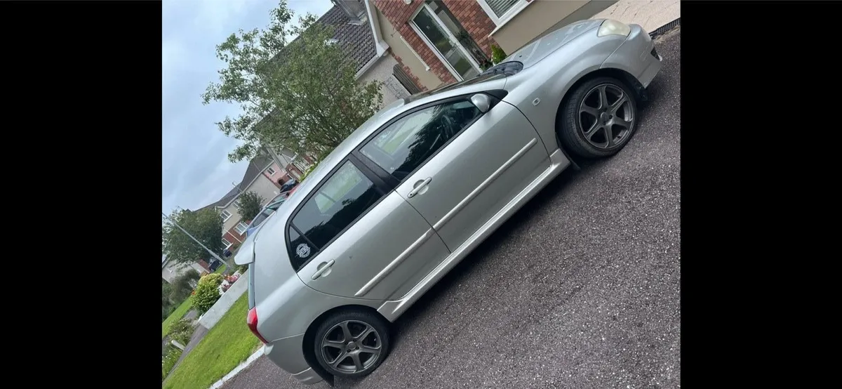 Toyota corolla  2006 e12 - Image 1