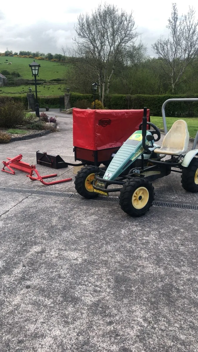 Berg tractor with implements - Image 1