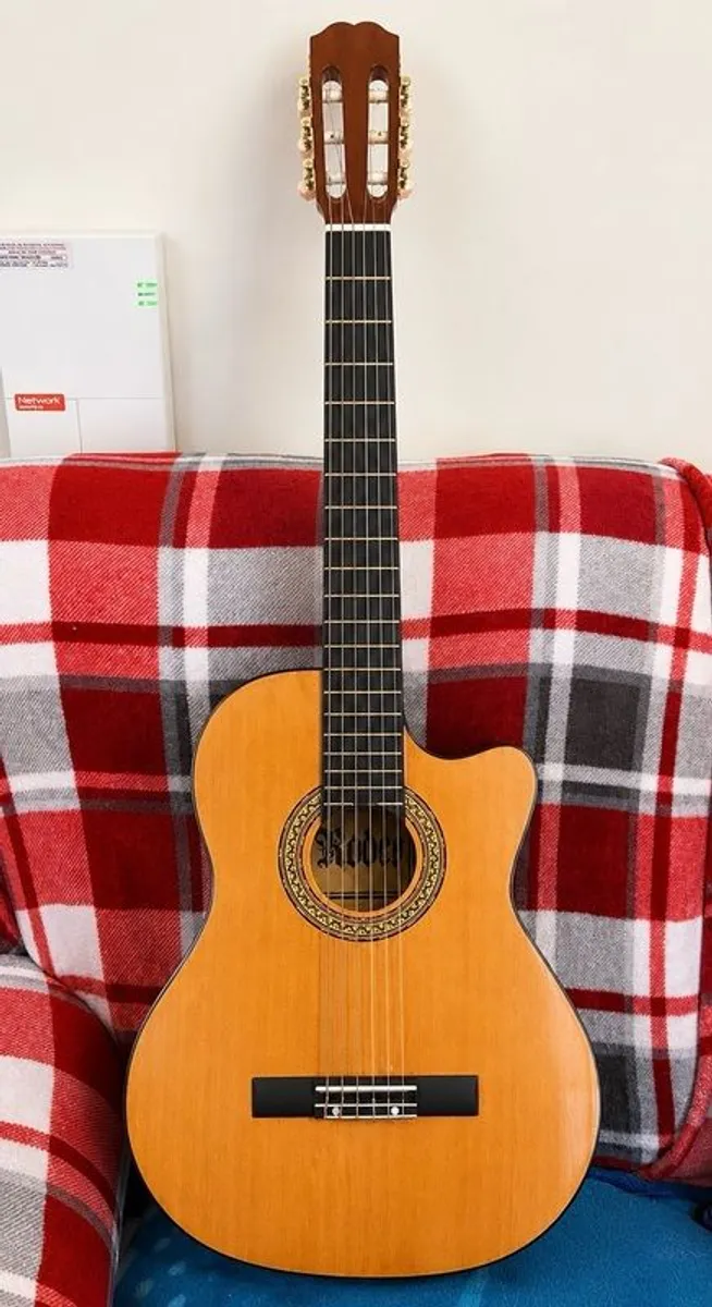 Rodeo Electro Classical Guitar and Free New Wall Hanger - Image 1
