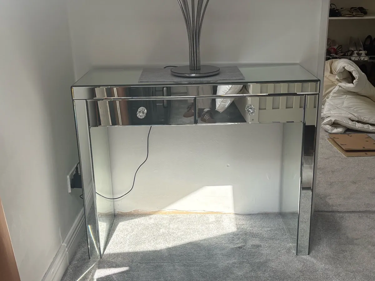 3 mirrored console tables