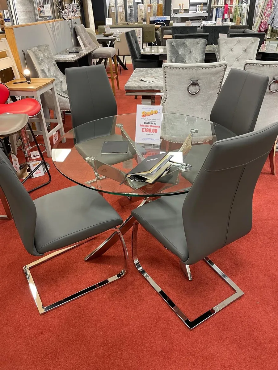 Glass dining table and 4 leather chairs - Image 1