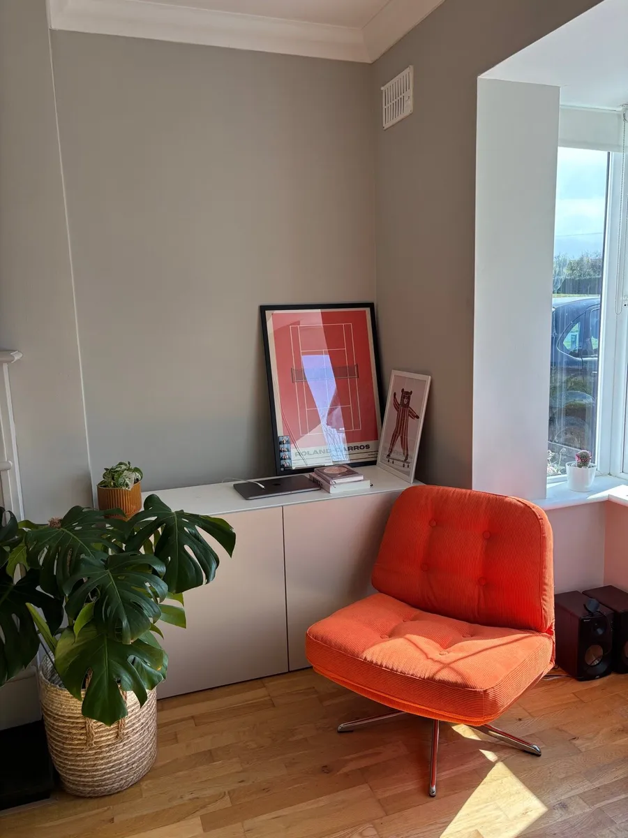 Orange swivel chair