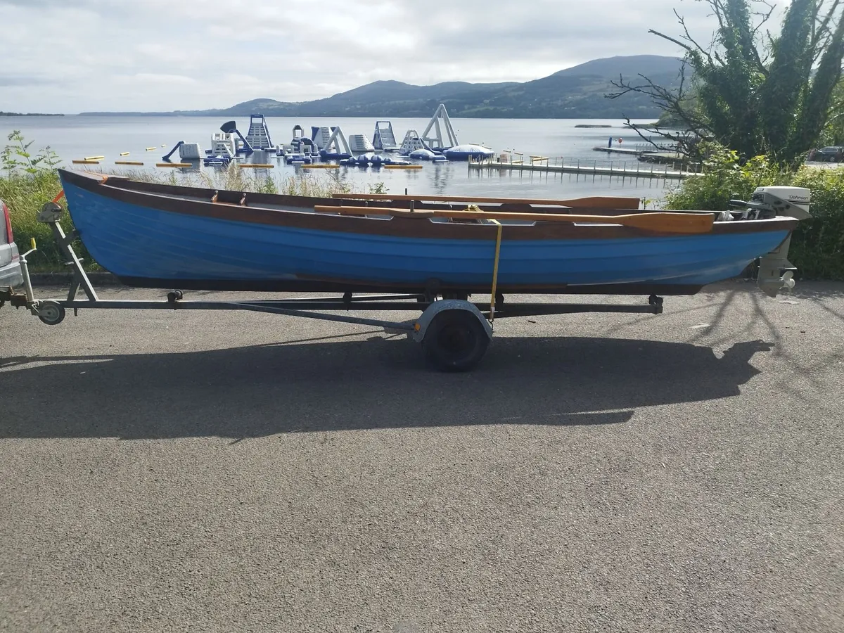 19Ft Lake Boat with Johnson 9.9 Motor and Trailer - Image 1