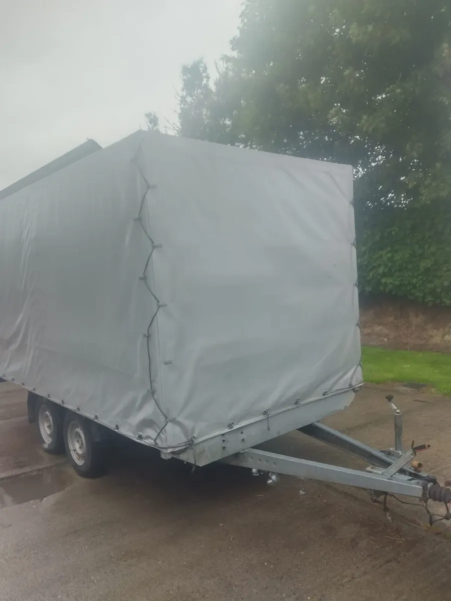 Twin axle tarp covered trailer - Image 1