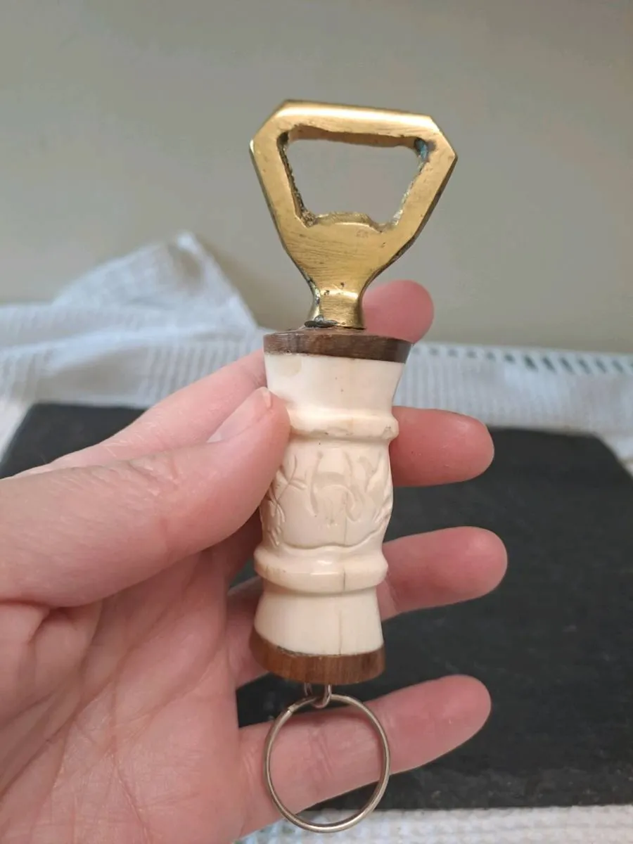 Hand-Carved Zambian Bone & Copper Bottle Opener - Image 1