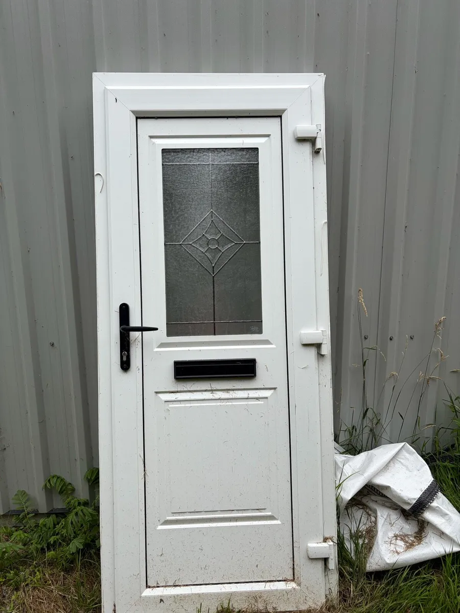 2 White uPVC Exterior Doors with frames and keys - Image 1