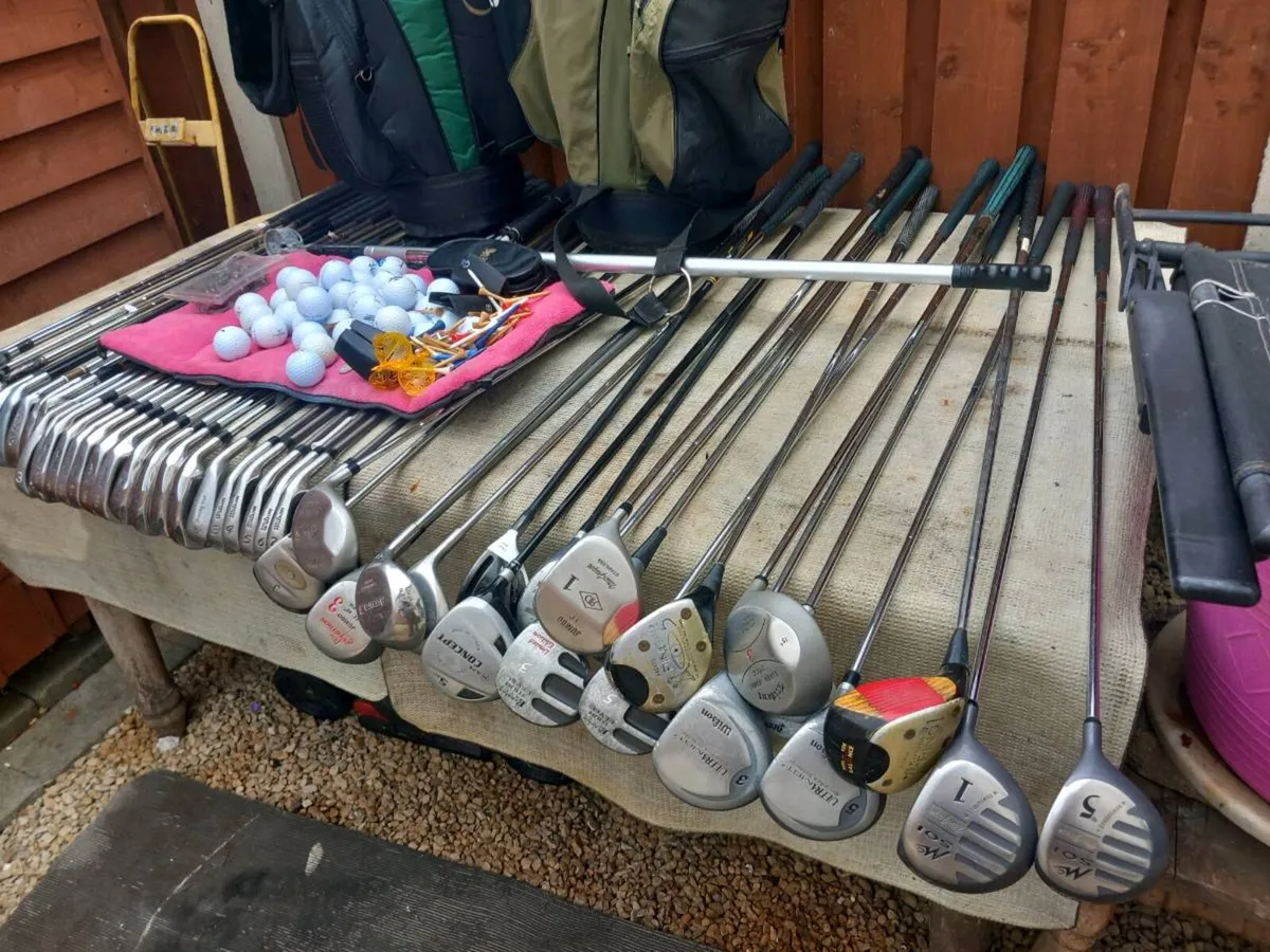 A selection of golf clubs and bags - Image 1