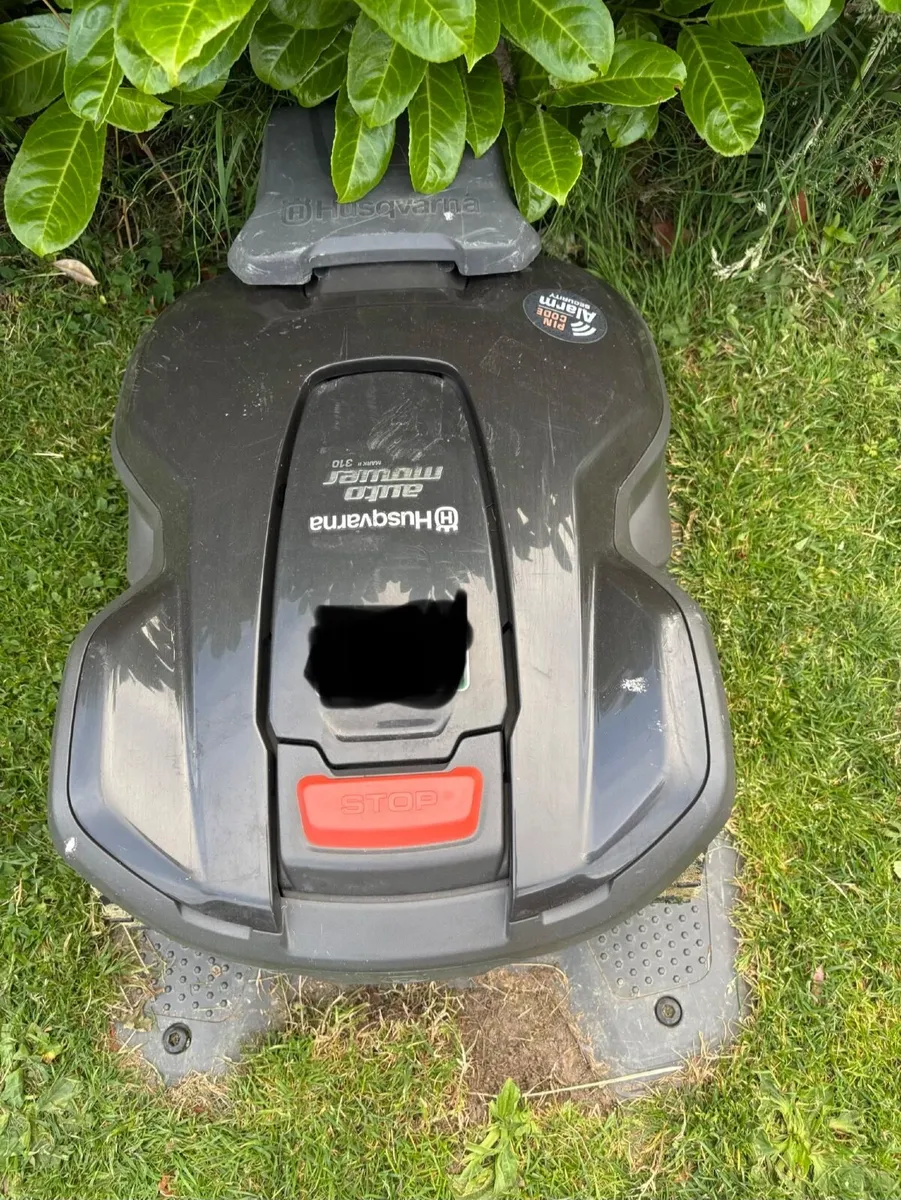 2 x Husqvarna 310 Auto Mowers Plus Dock - Image 1