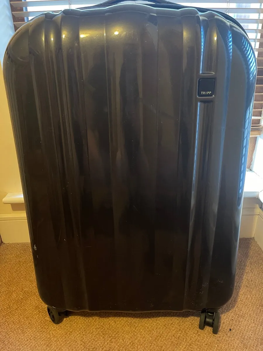 FREE Tripp Large Lightweight Suitcase - Image 1