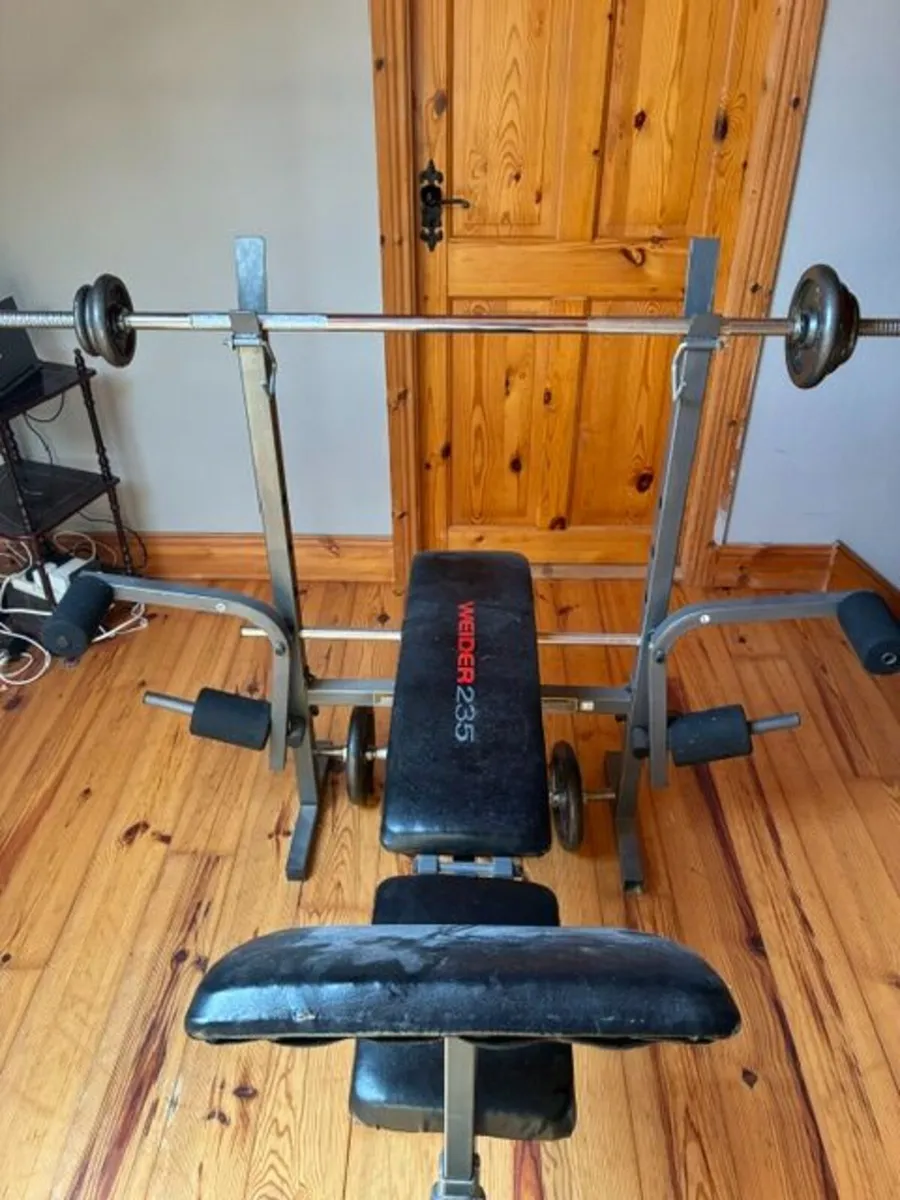excercise bike and bench press with weights - Image 1