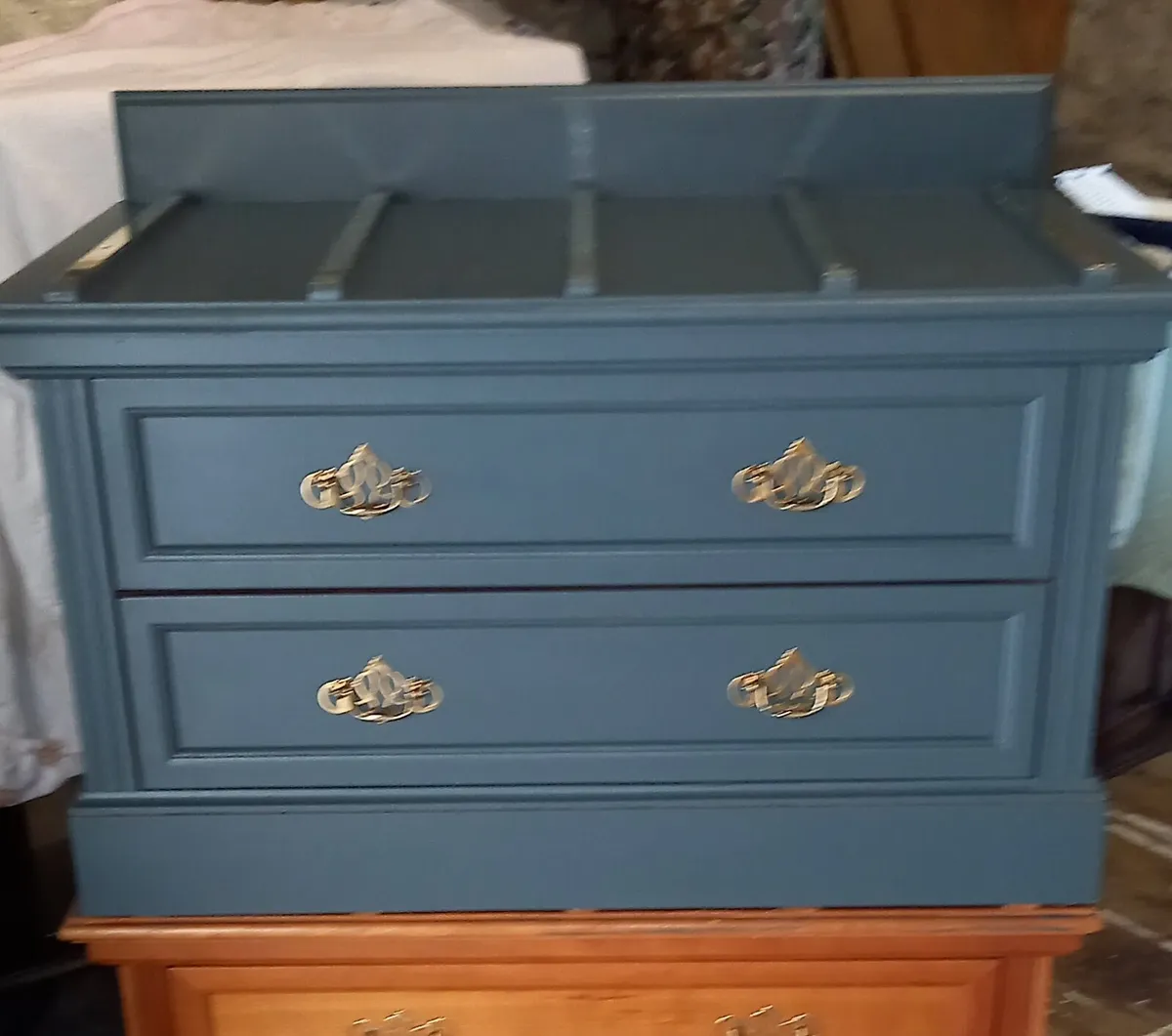 Chest of drawers with suitcase set diwn on top - Image 1