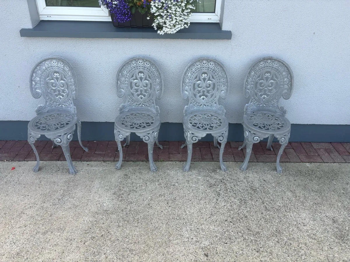 Cast iron garden chairs - Image 1