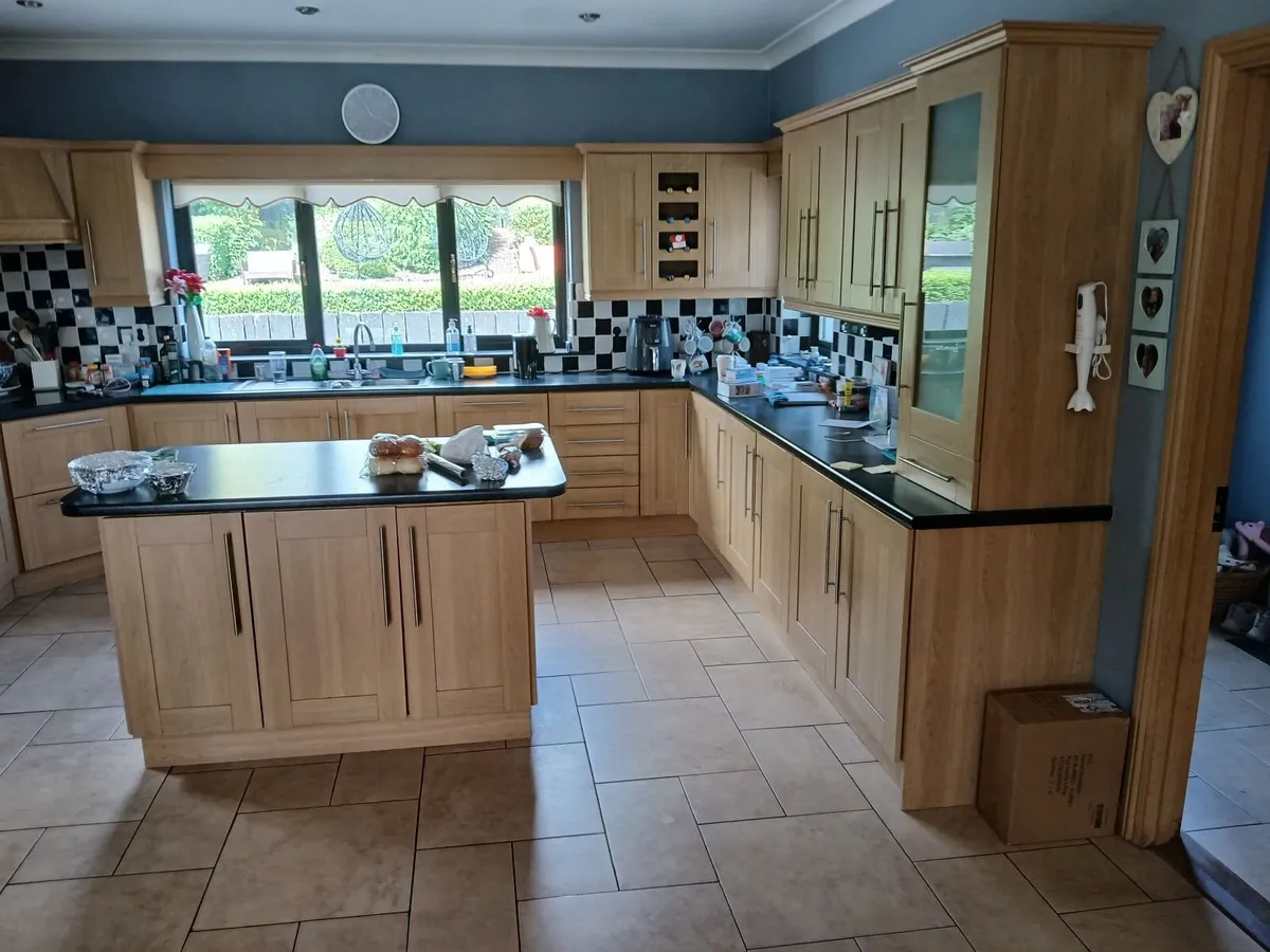 34 Kitchen cabinets, island, counters, etc. - Image 1