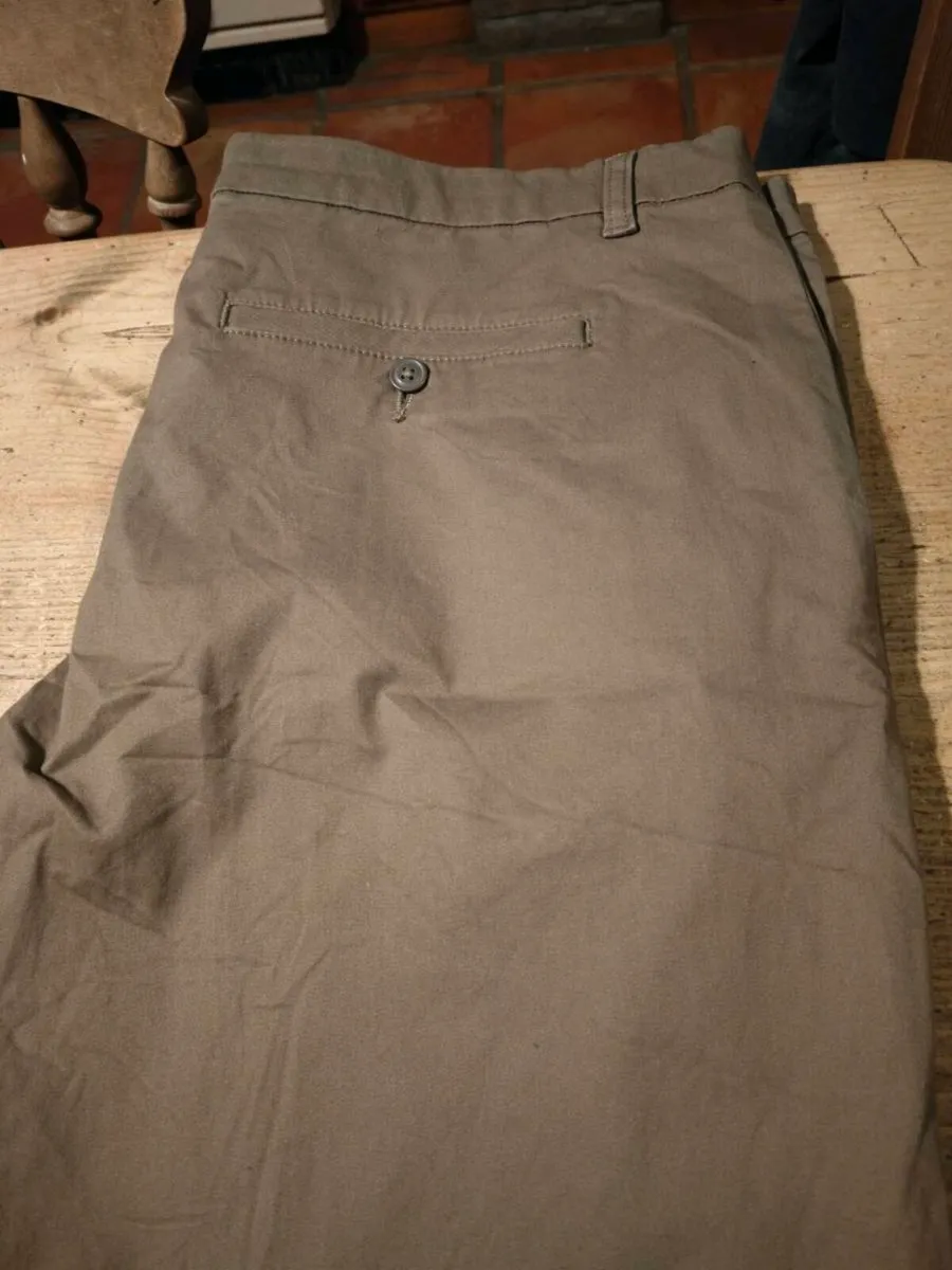 Mens Dunne Stores tan trousers. W. 40"
Leg. 30". 9 - Image 2