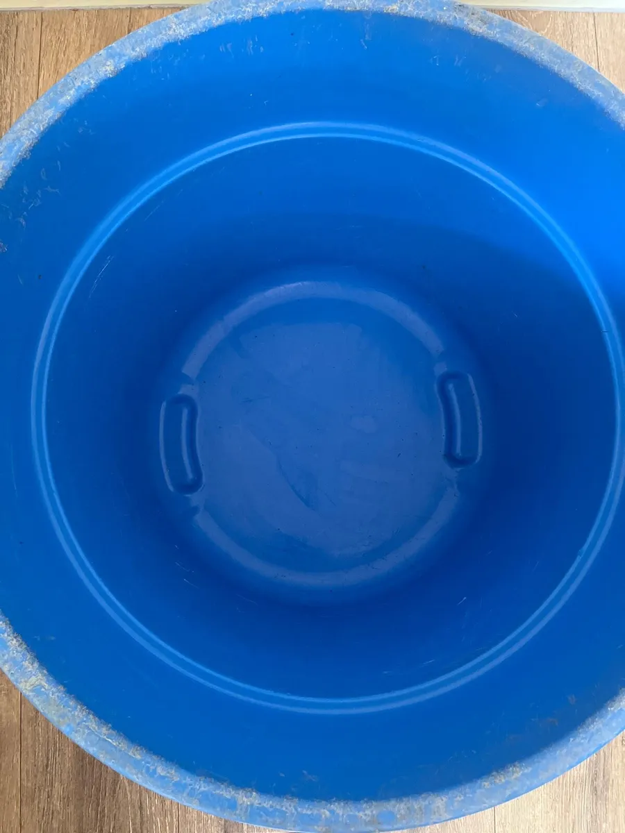 A blue hard plastic barrel or container - Image 2