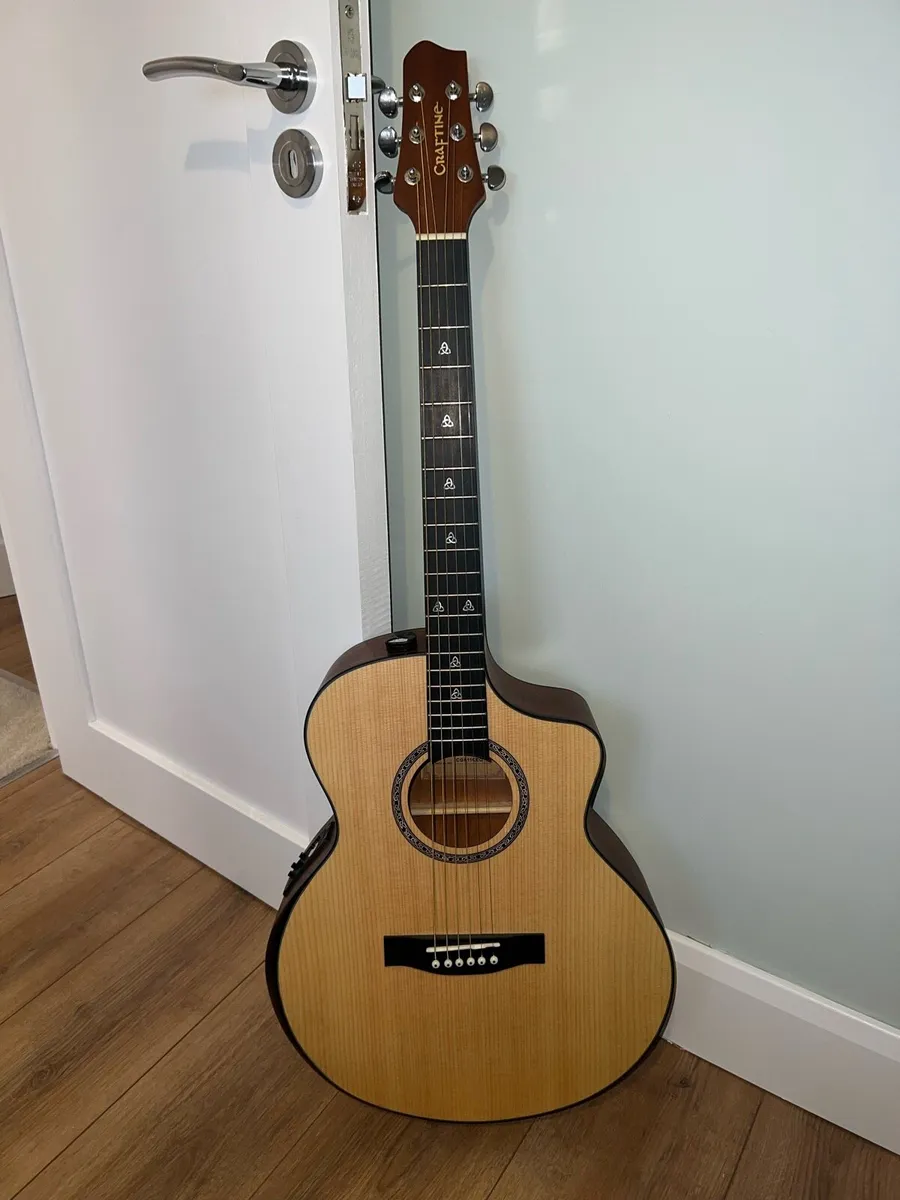 Acoustic Guitar - Image 1