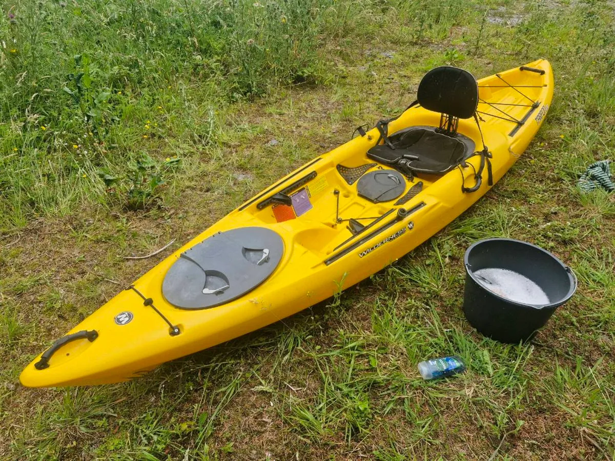 Tarpon 120 kayak with paddle trolley and pfd - Image 1