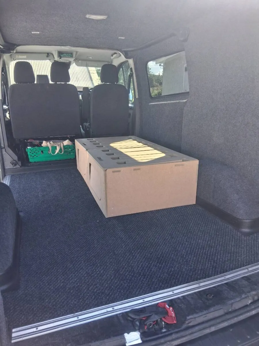 Sliding camper seat bed storage - Image 2