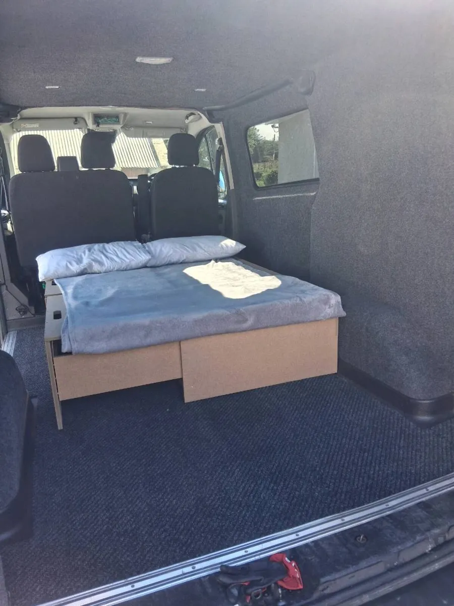 Sliding camper seat bed storage - Image 3