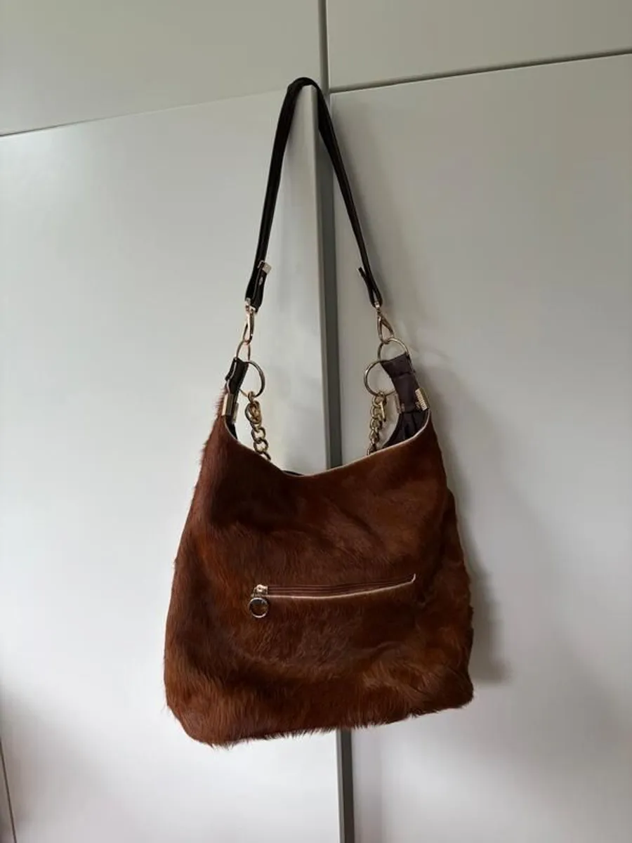 Cow hide handmade bag - Image 1