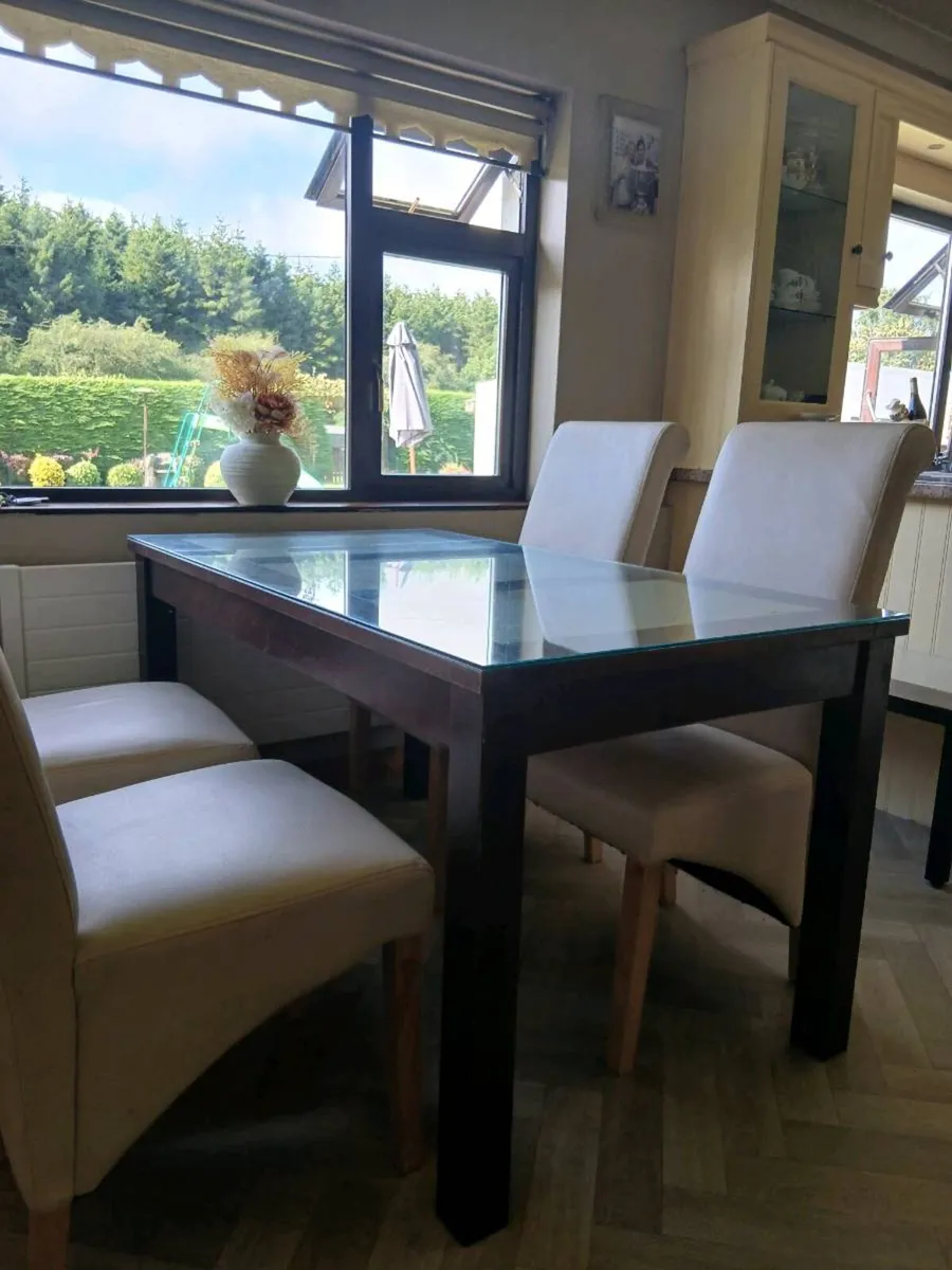 Dining Table and 4 leather chairs - Image 1