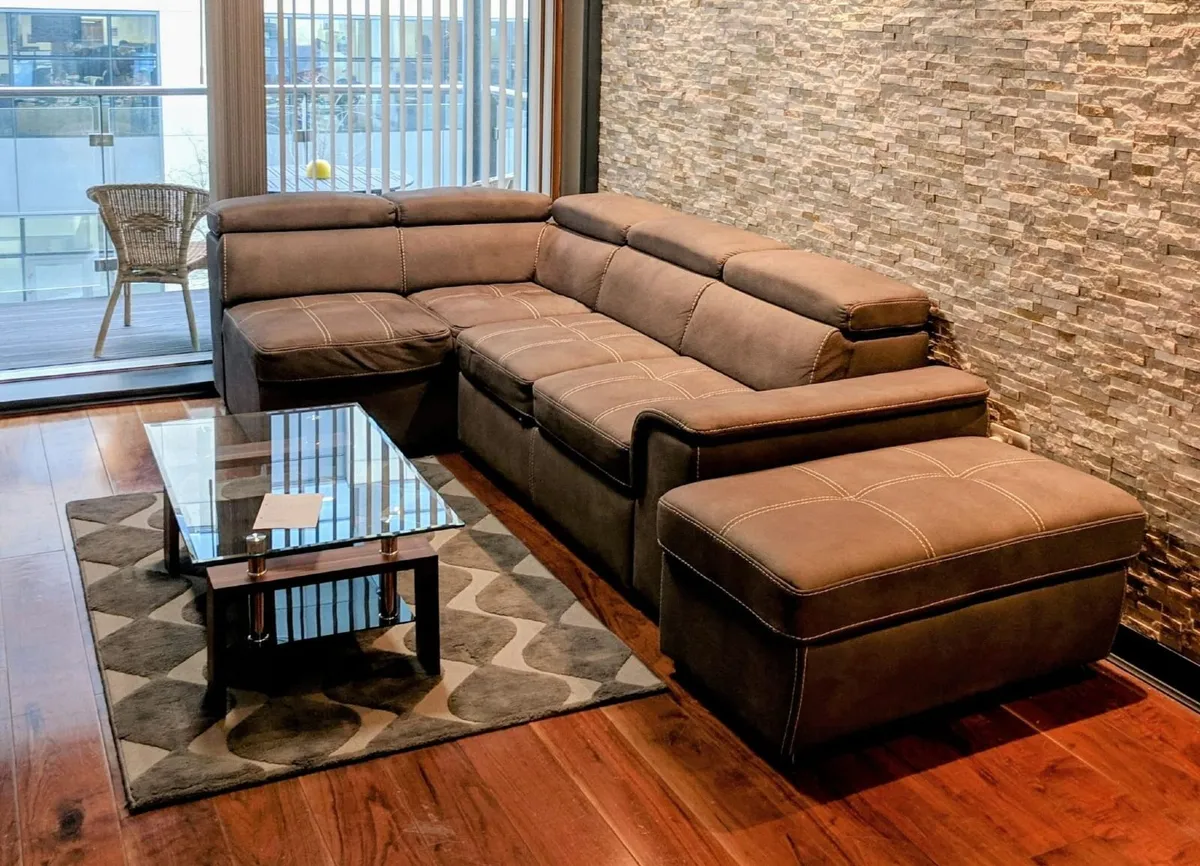Corner sofa with sleeper bed