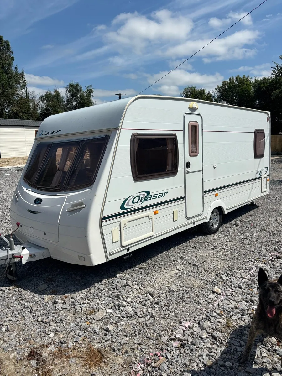 ABSOLUTELY SPOTLESS FIXED BED CARAVAN - Image 1