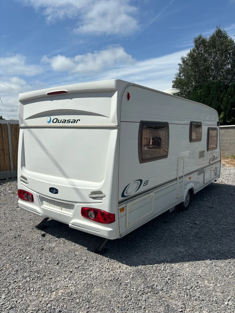 ABSOLUTELY SPOTLESS FIXED BED CARAVAN - Image 3