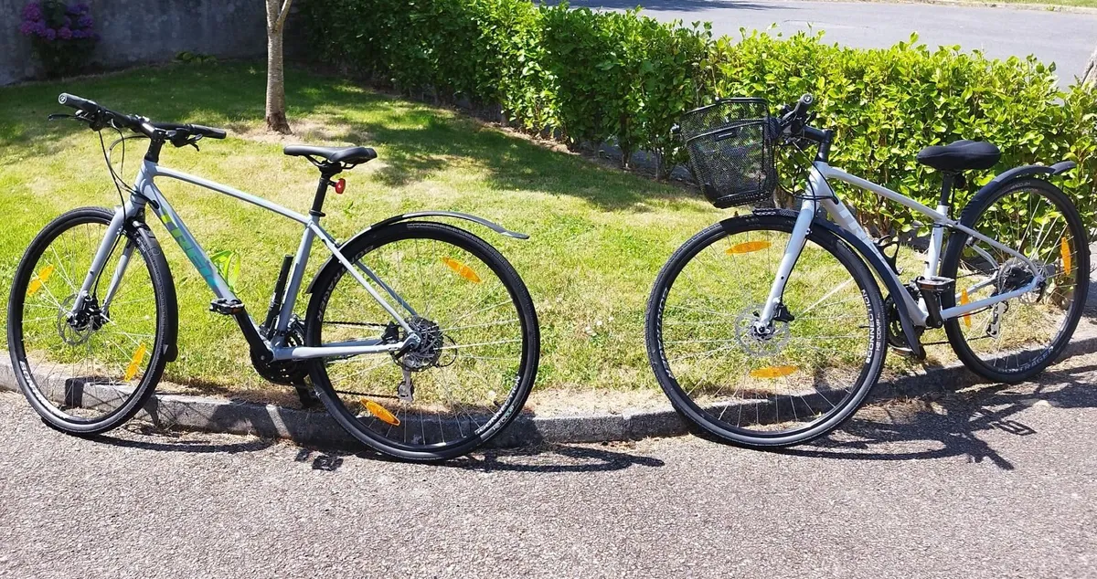 Pair of Trek FX2 Hybrid Bikes (Ladies/Men) as new - Image 1