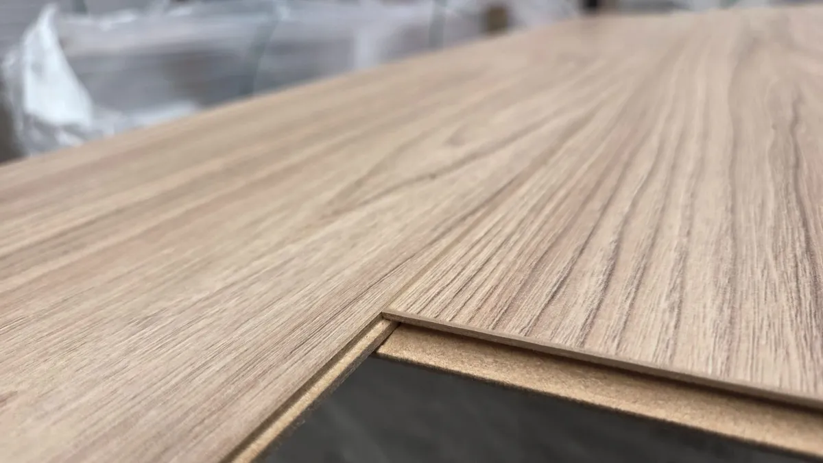 8mm laminated click flooring Delivered - Image 1