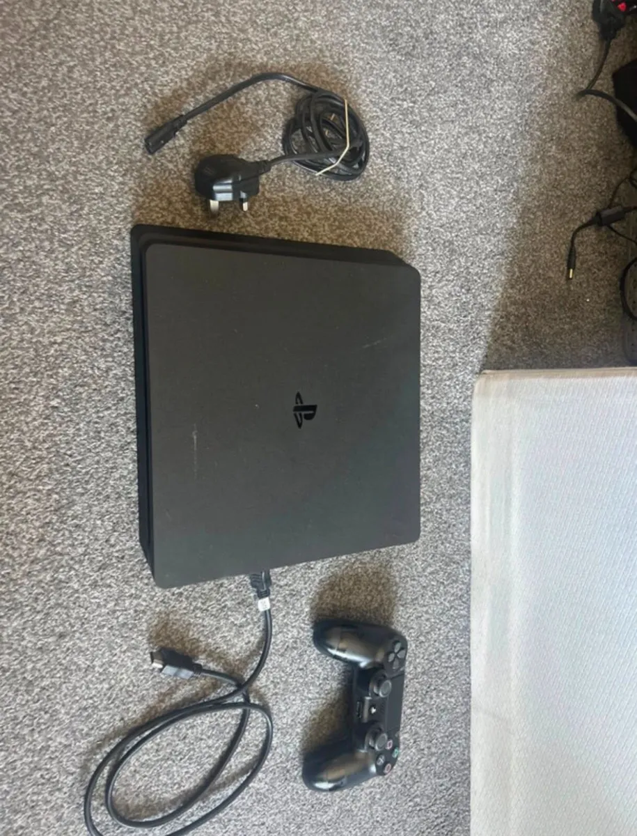 PS4 1TB Slim Black with warranty - Image 1